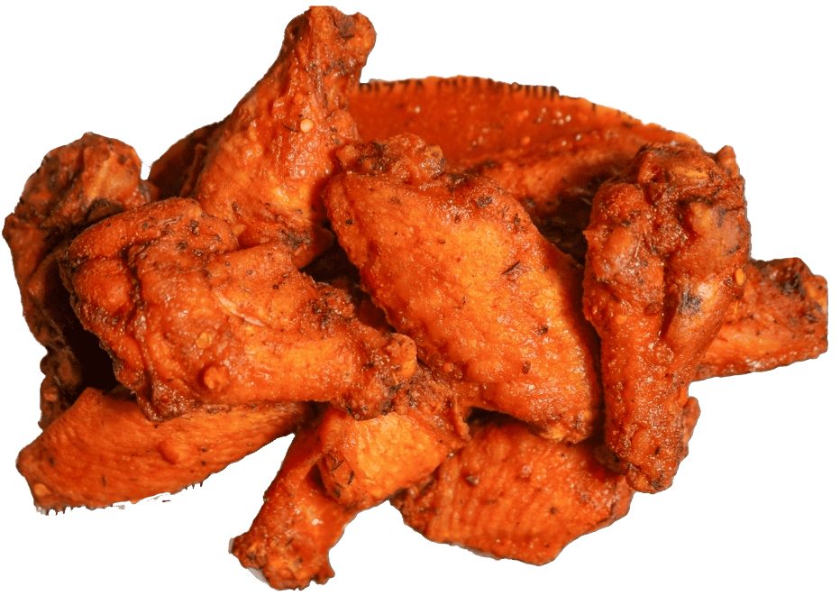 A pile of cooked chicken wings with a crispy, seasoned coating sits ready to be enjoyed at Pittsburgh Pizzeria. The wings appear to be well-cooked with a textured surface, making them the perfect appetizer alongside your favorite Caliente Pizza.