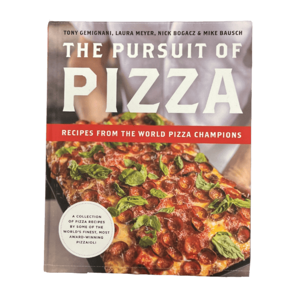 Cover of "In The Pursuit of Pizza" by World Pizza Champions, with a rectangular pepperoni and basil pizza. Authors are listed at the top.